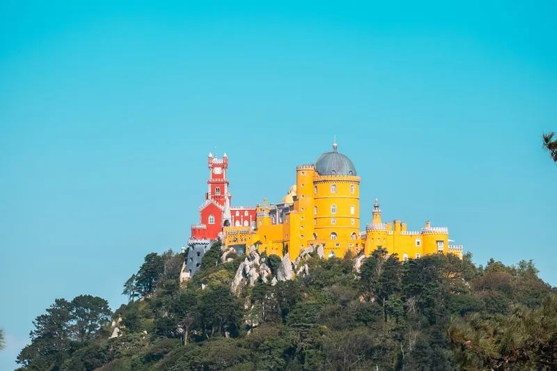 Pena Palace surrounded by the forested hills of Sintra