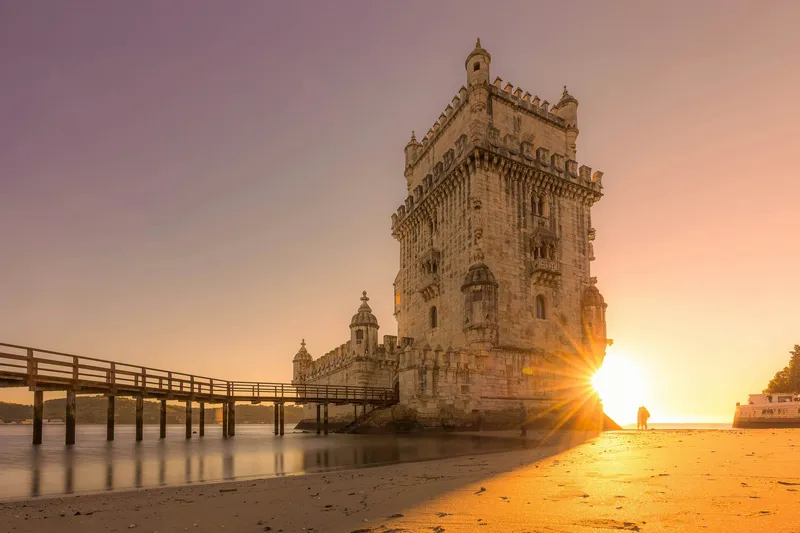 Belém Tower on the waterfront in Lisbon at sunset